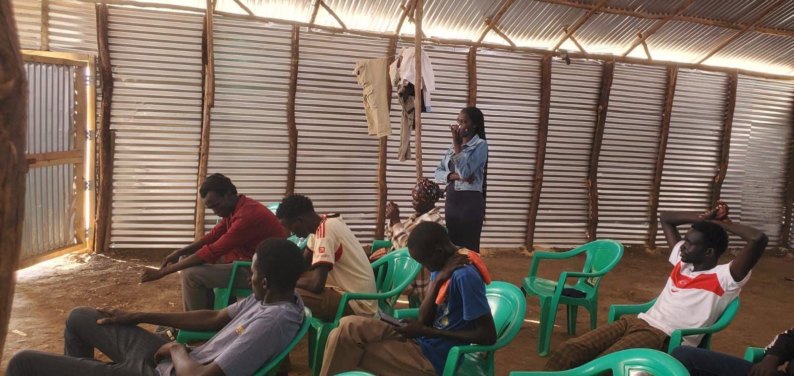 a mentor in conversation with a young person