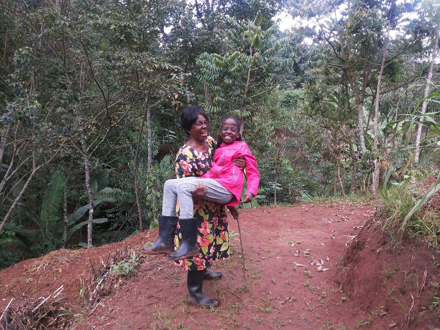 a community member planting tree seedlings